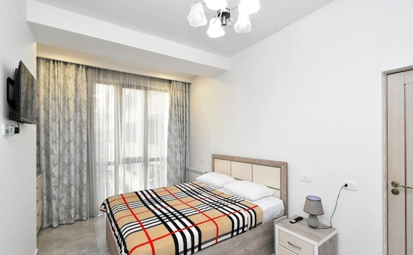 Basic Apartment | Blackout drapes, iron/ironing board, free WiFi