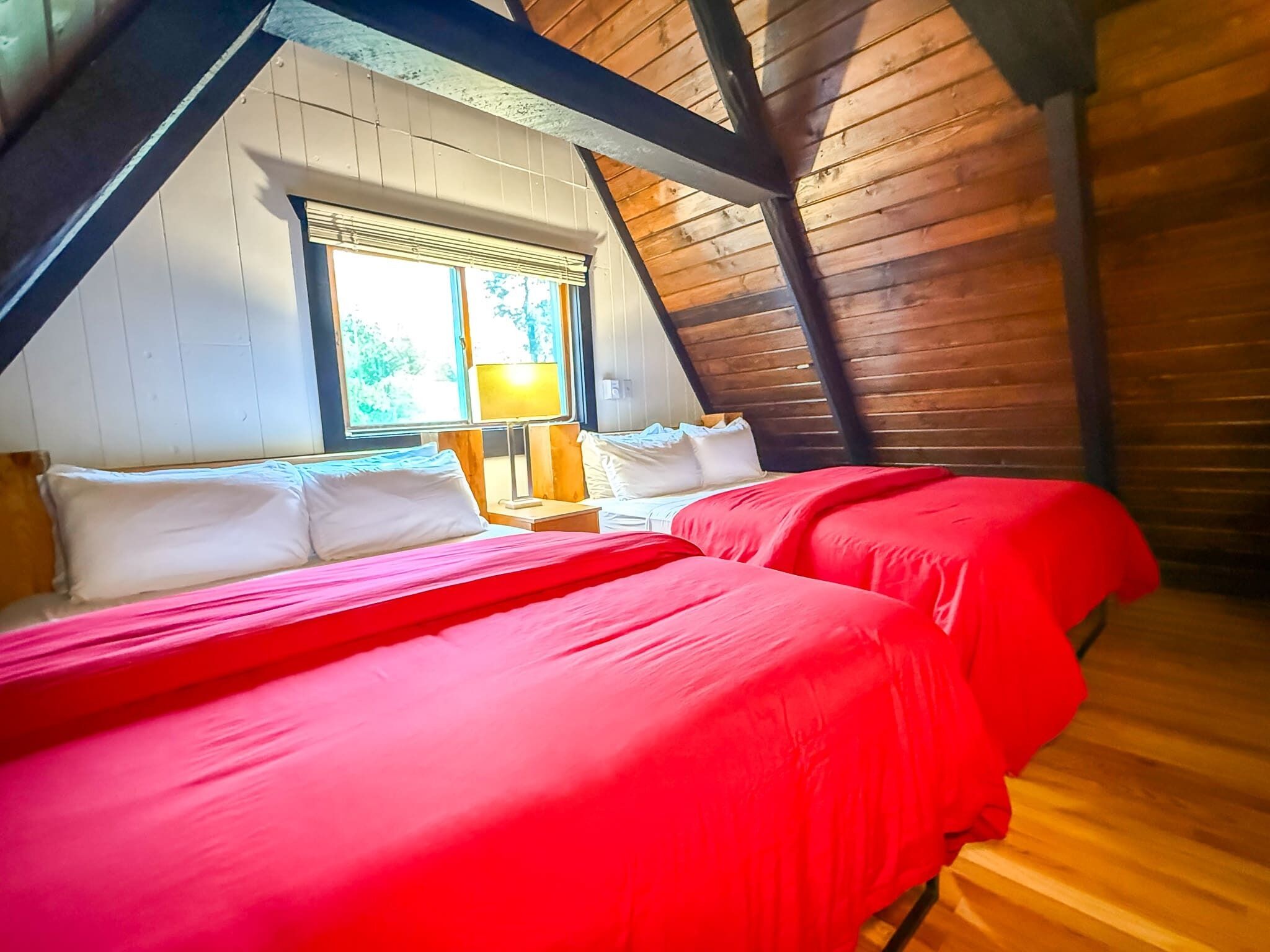 Two queen beds and beautiful cathedral ceilings.