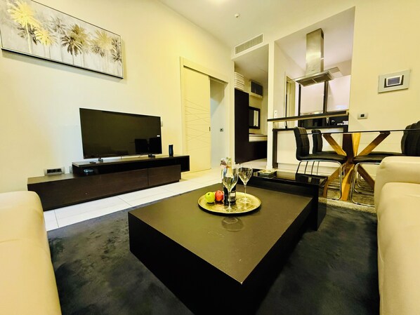Apartamento luxo, vista para o mar | Área de estar