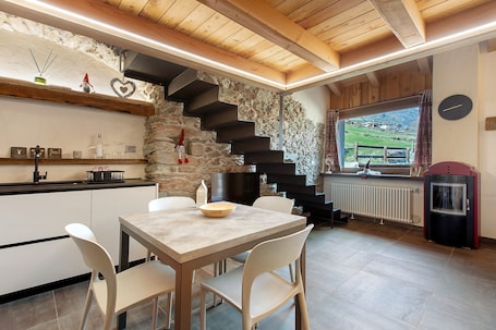 Dining. Chez Margot et Sophie – Charm, Stonework and Alpine Views