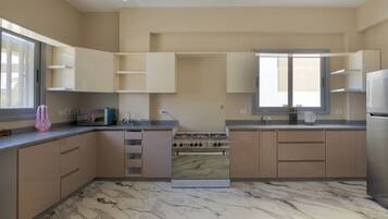 Villa Deluxe, vistas al jardín | Cocina privada