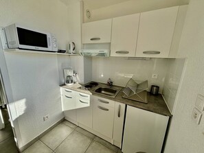 Fridge, microwave, coffee/tea maker