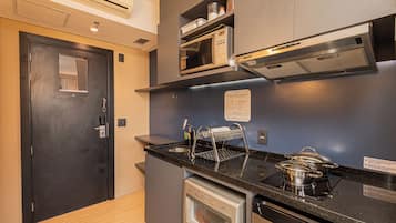 Standard Studio, City View | Private kitchen | Mini-fridge, microwave, stovetop, dishwasher