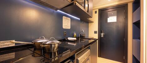 Basic Studio, City View | Private kitchen | Mini-fridge, microwave, stovetop, dishwasher