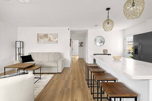 Living area - ✨ Spacious 3BR/2BA San Diego retreat! Sleeps 8 🛏 with modern kitchen 🍳, open living space, and sunny backyard 🌞. Safe, family-friendly neighborhood 👨‍👩‍👧 just 15 min to beaches, Mission Bay & top attractions. Spotless, stylish & welcoming! 🌴 (San Diego)