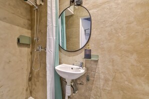 Shower, towels, toilet paper