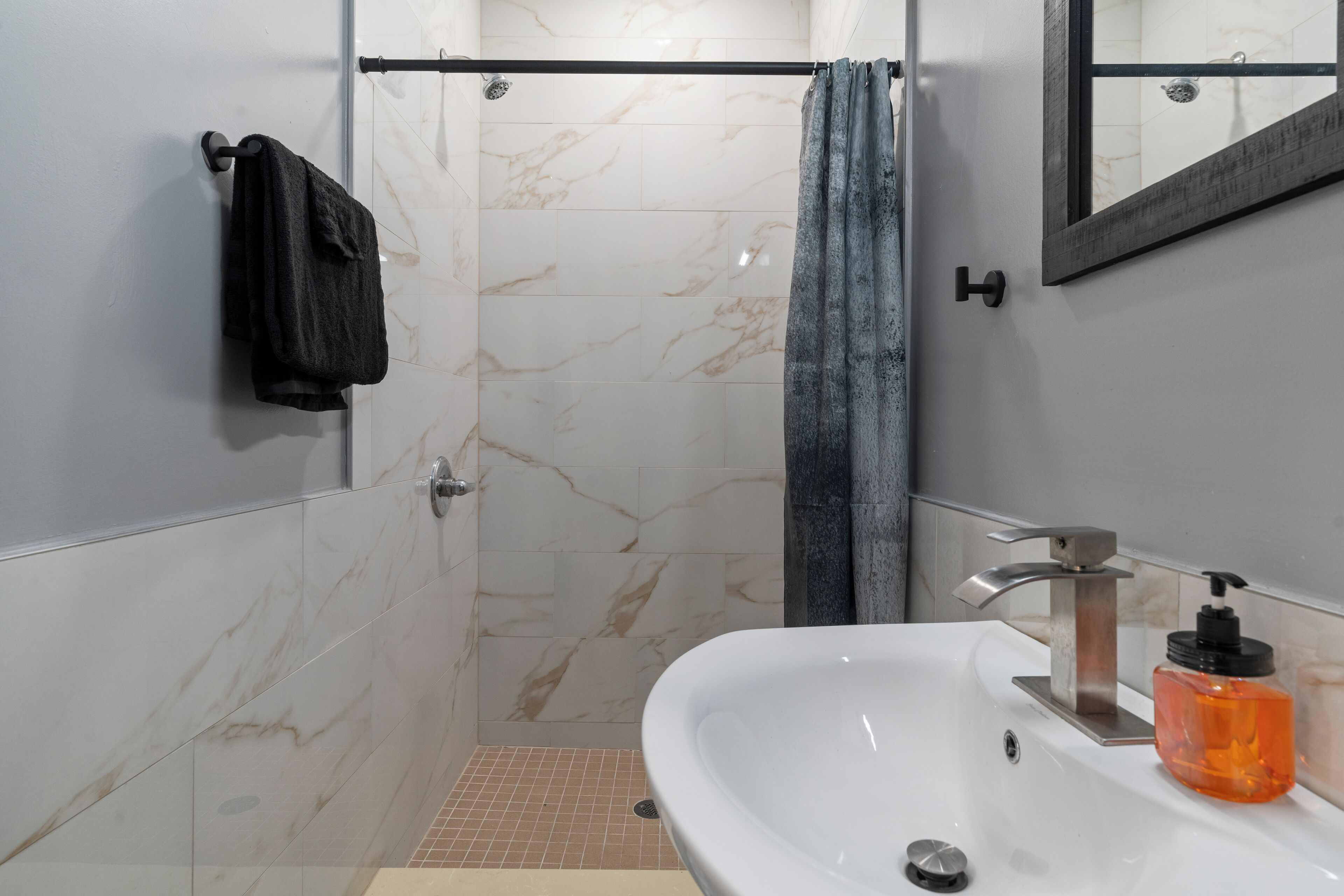 Shower, towels, soap, toilet paper