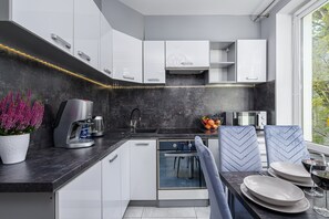 Comfort Apartment, Courtyard View | Private kitchen | Coffee/tea maker