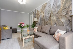 Comfort Apartment, Courtyard View | Living area | 40-inch flat-screen TV with digital channels