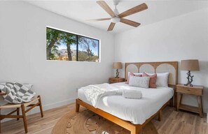 2 habitaciones, tabla de planchar con plancha, cuna de viaje y wifi 
