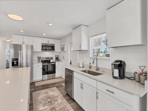 Soak up Florida Sunshine & be just 5 minutes to the beach!  Affordable Luxury