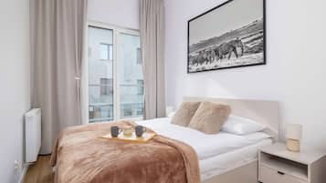 1 bedroom, desk, iron/ironing board, travel crib