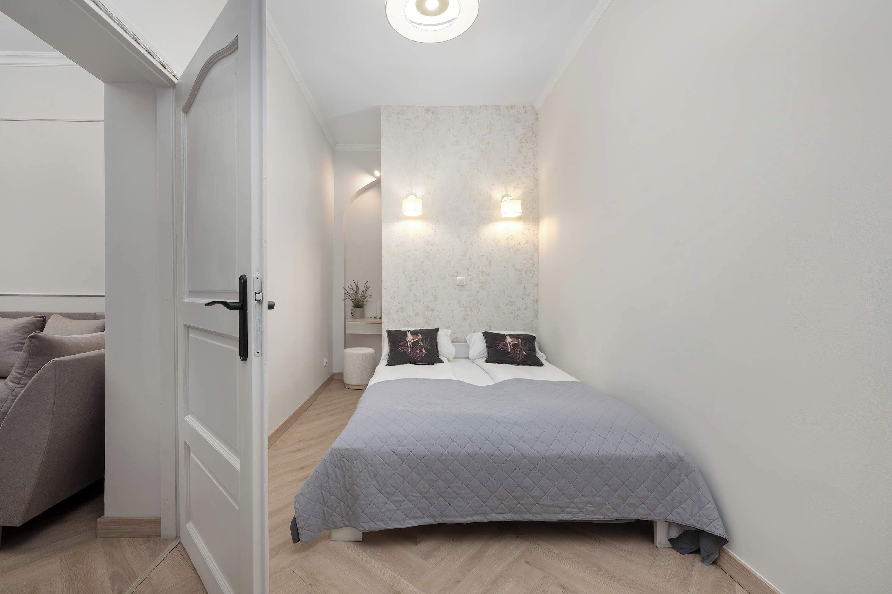 1 bedroom, desk, iron/ironing board, travel crib