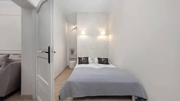 1 bedroom, desk, iron/ironing board, travel crib