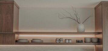 Deluxe Studio, Garden View | Private kitchen | Stovetop, dishwasher, cookware/dishes/utensils, dining tables