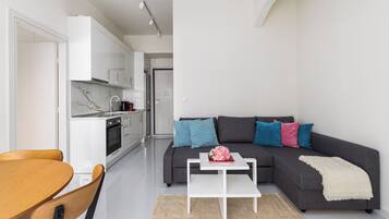 Apartment, 2 Bedrooms, Balcony, City View | Living area | 40-inch Smart TV with digital channels