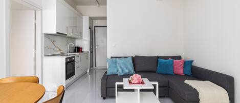 Apartment, 2 Bedrooms, Balcony, City View | Living area | 40-inch Smart TV with digital channels