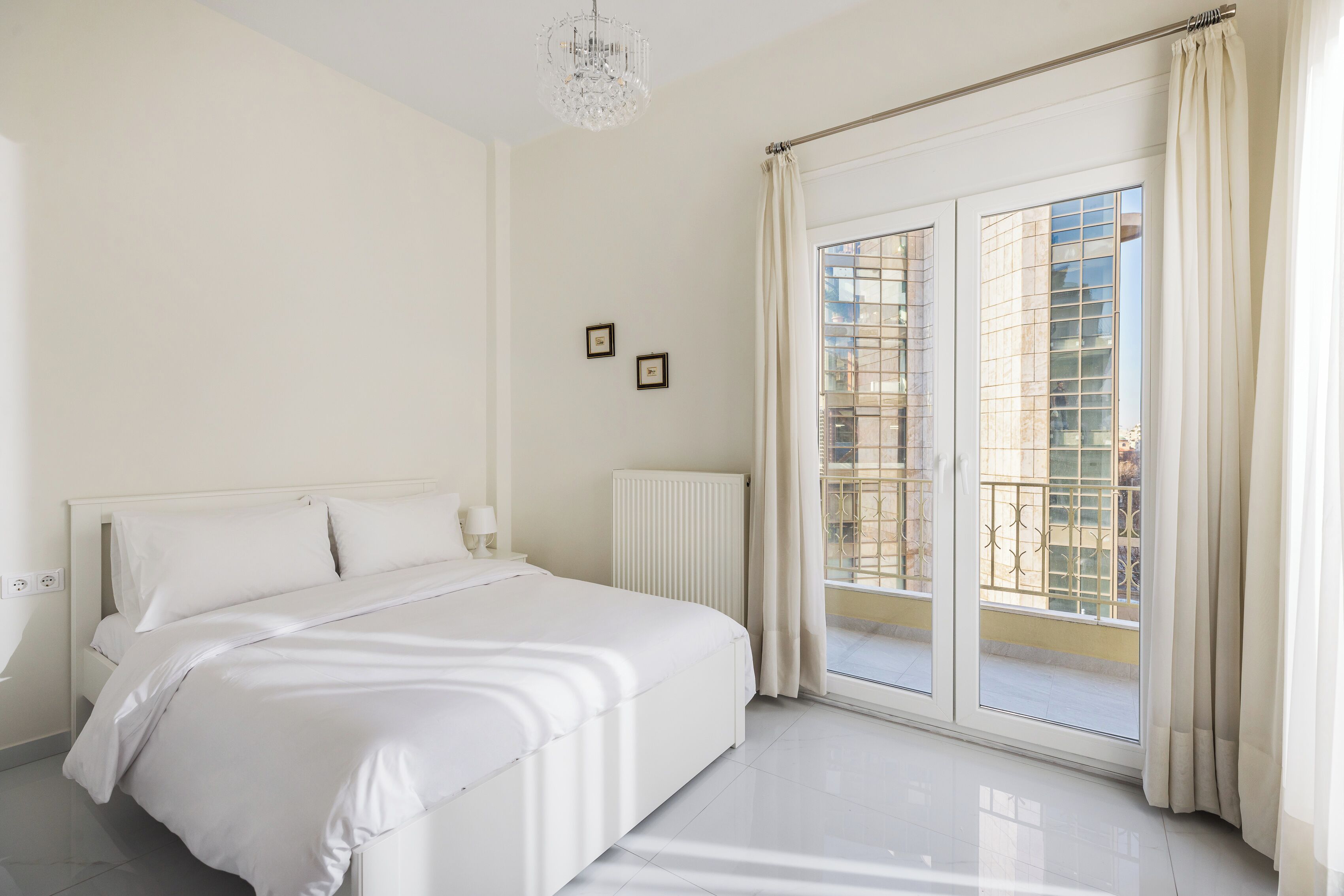 Apartemen, 2 kamar tidur, balkon, pemandangan kota | Tirai kedap cahaya, setrika/meja setrika, dan Wi-Fi gratis