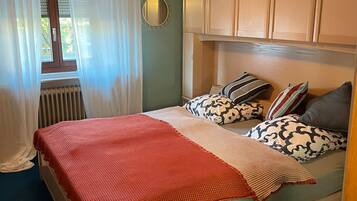 2 dormitorios, tabla de planchar con plancha, wifi y ropa de cama