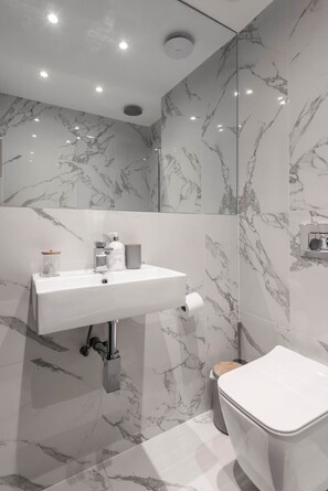 Hair dryer, towels, soap, shampoo