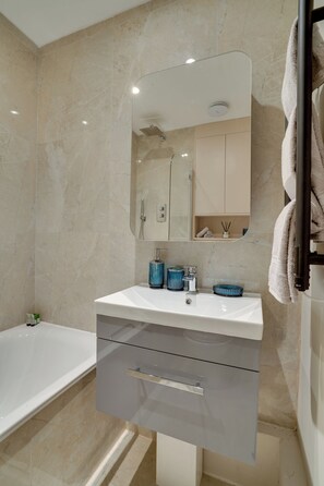 Hair dryer, towels, soap, shampoo