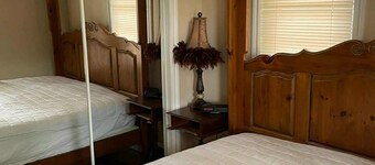 Chic Grand Bend Escape – Fireplace, Hot Tub & Walk to Beach