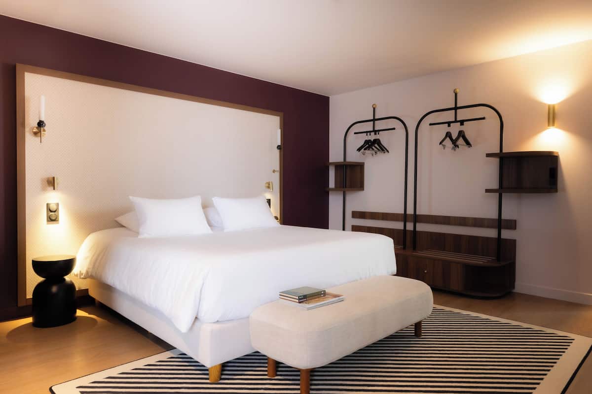 Exclusive Double Room | Premium bedding, laptop workspace, blackout drapes, iron/ironing board