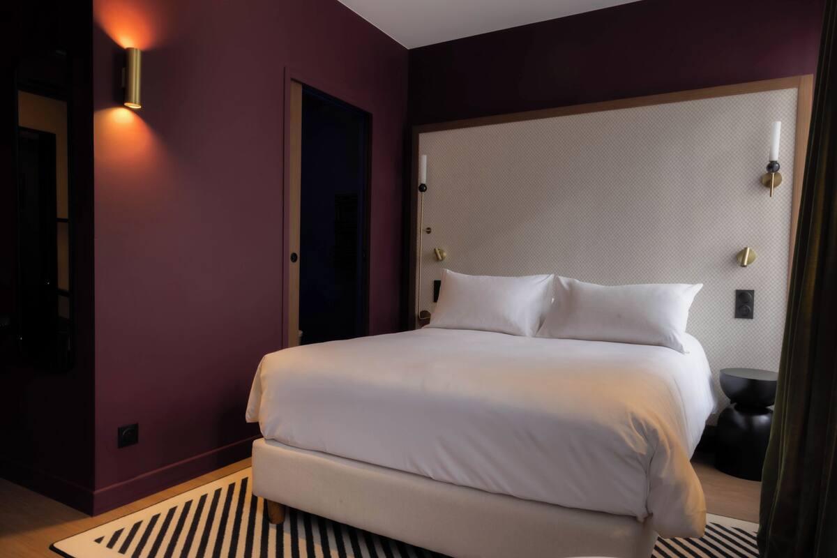 Premium bedding, laptop workspace, blackout drapes, iron/ironing board