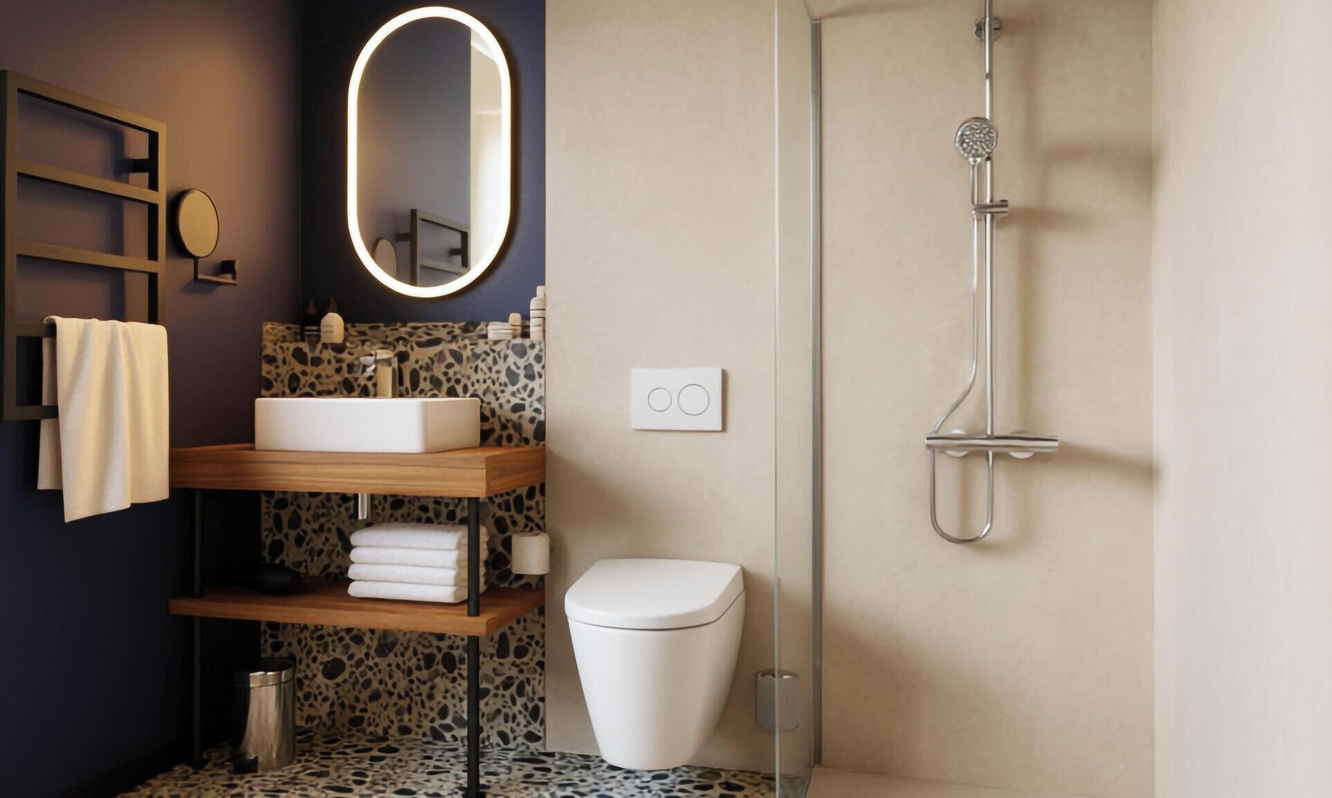 A modern bathroom with a freestanding sink, a toilet, a shower, and a mirror with a lighted frame.