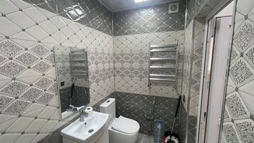 Standard Double Room, City View | Bathroom | Free toiletries, hair dryer, slippers, towels