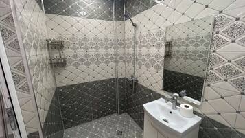 Standard Double Room, City View | Bathroom | Free toiletries, hair dryer, slippers, towels