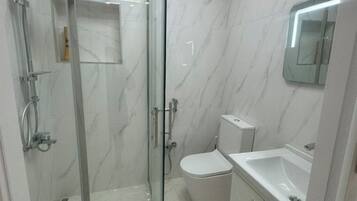 Standard Double Room, City View | Bathroom | Free toiletries, hair dryer, slippers, towels