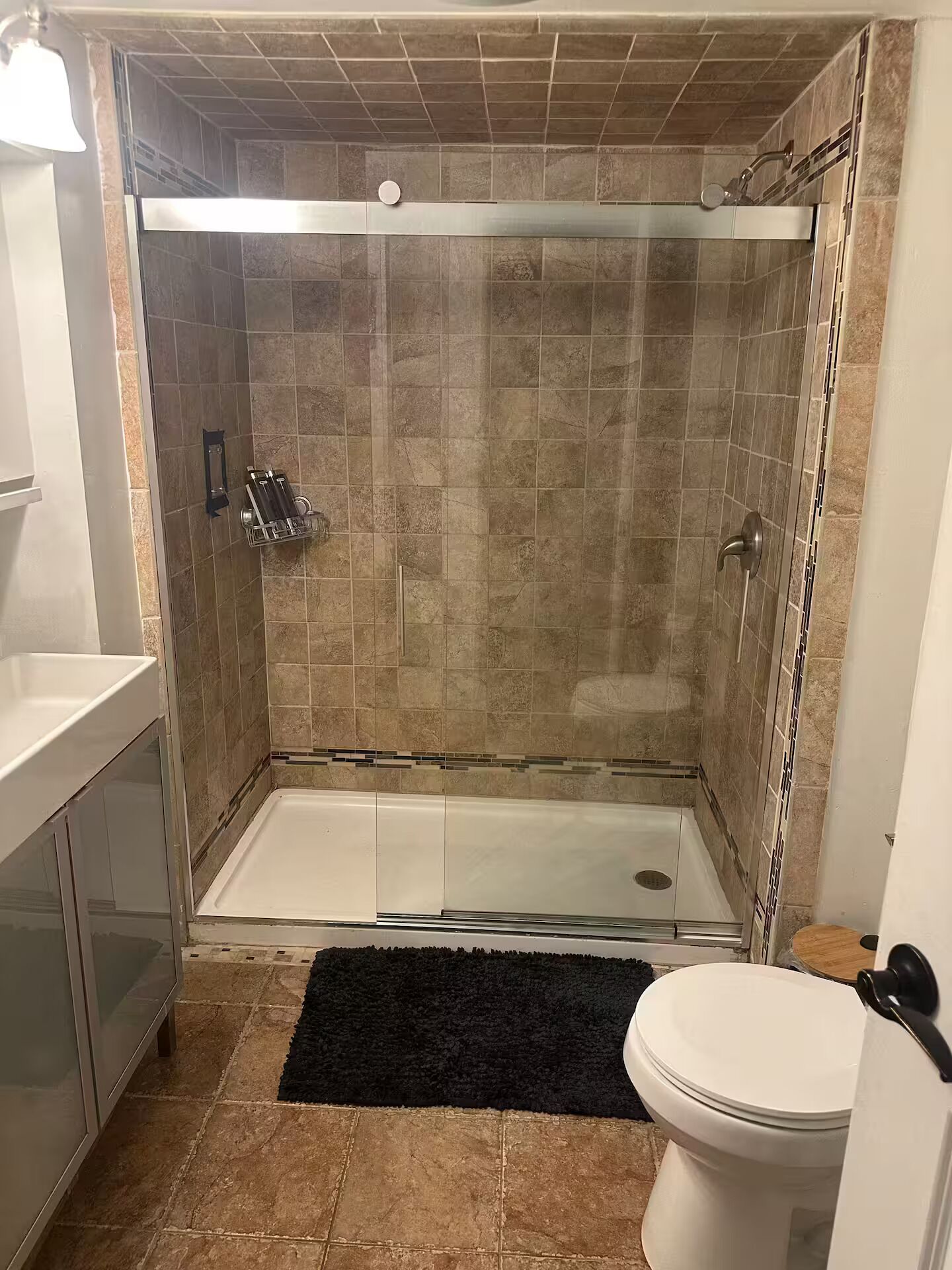 Shower, towels, soap, toilet paper