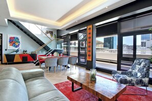 Deluxe Penthouse, Balcony, City View | Living area