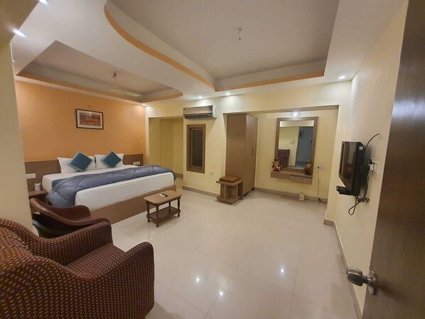 Superior Double Room, Balcony, City View | In-room safe, desk, laptop workspace, blackout drapes