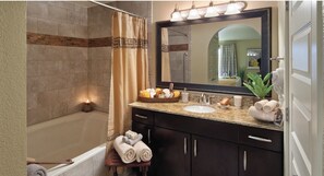 Hair dryer, towels, soap, shampoo