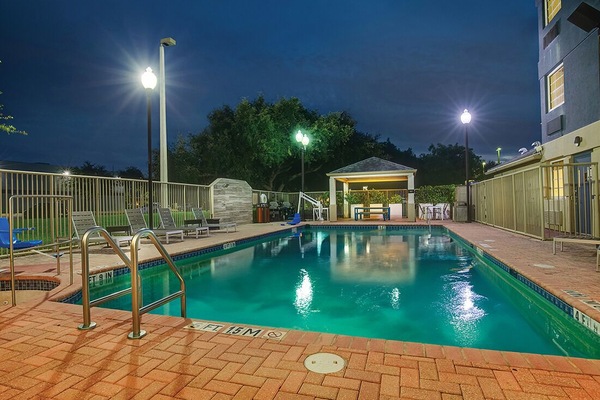Unwind after dark with a calming, illuminated evening swim.
