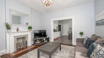 Apartment, 1 Queen Bed with Sofa bed, Patio, Garden View (Queen City Suites 1) | Living area