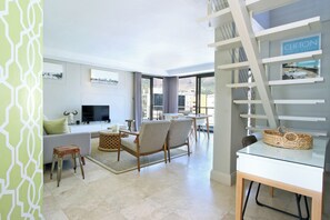 Deluxe penthouse, terras, uitzicht op de stad | Woonruimte