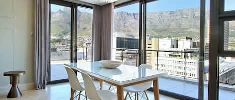 Deluxe Penthouse, Patio, City View | Living area