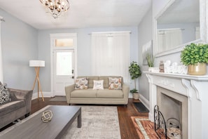 House, Multiple Beds, Patio, Garden View (Queen City Suites) | Living area