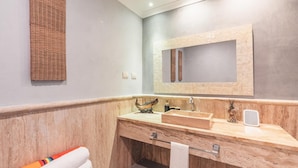 A modern bathroom with a large mirror, two sinks, and a wooden vanity. - Studio 3 Guests Balcony With Views Fishing Lodge (Punta Cana)