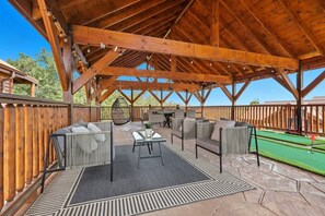 Outdoor dining - New! Game Time Retreat! Waterfall, Galaxy Pool, Rooftop Theater, Spa, Sauna! (Sevierville)