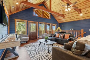 TV, fireplace - New! Game Time Retreat! Waterfall, Galaxy Pool, Rooftop Theater, Sauna, Hot Tub! (Sevierville)