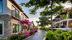Premium Suite, Balcony, River View | In-room safe, desk, blackout curtains, iron/ironing board