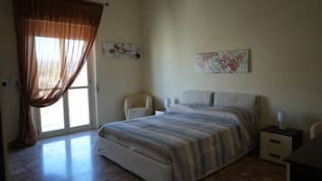 House, 2 Bedrooms, Balcony, City View | Premium bedding, down comforters, blackout drapes, iron/ironing board