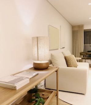 Deluxe Apartment | Living area | 55-inch Smart TV with cable channels, Netflix, streaming services