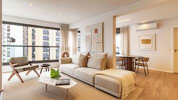 Premium Apartment | Living area | 55-inch Smart TV with cable channels, Netflix, streaming services