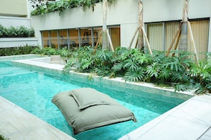 Outdoor pool, pool umbrellas, pool loungers