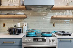 Fridge, oven, cookware/dishes/utensils